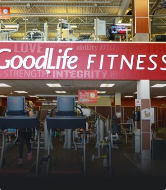 Interior of a GoodLife Fitness club with cardio machines 