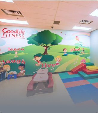 Childminding area in a GoodLife Fitness Club with a mural on the wall and equipment for kids